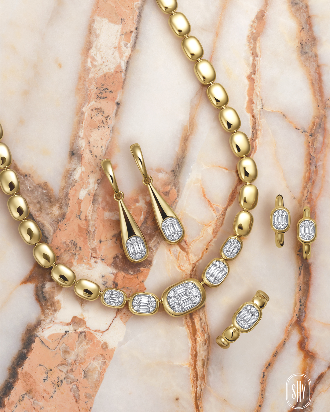 gold and diamond earrings, necklace and rings