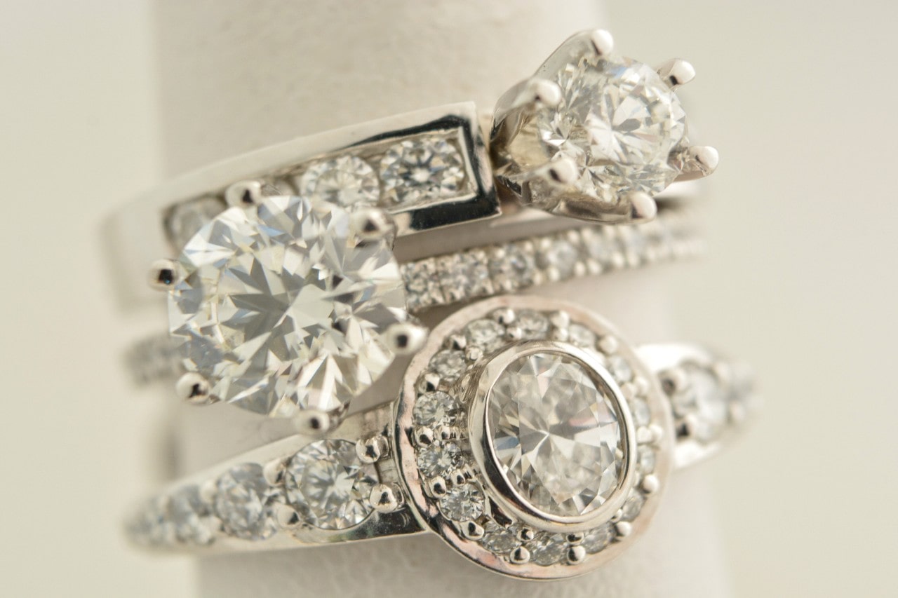 three engagement rings in various styles three engagement rings in various styles